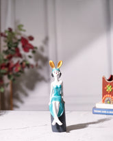 Seated Girl Figurine with Bunny Ears